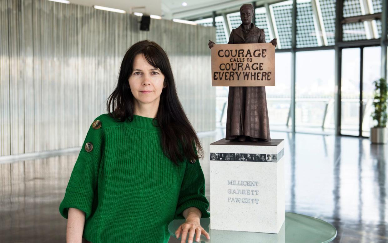 Gillian Wearing with a model of suffragist leader Millicent Fawcett  - PA