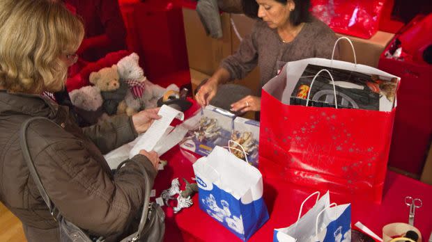 woman buying Christmas present