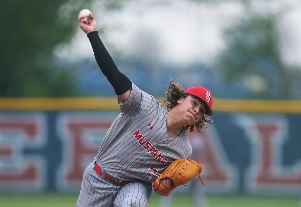 DCG’s pitcher Keaton Fenn pitches the ball against Ballard in the season opening game at Nite Hawk Field on Monday, May 13, 2024, in Slater, Iowa.