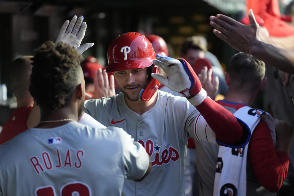 Philadelphia Phillies' Trea Turner, right, celebrates his two-run home run off Chicago Cubs starting pitcher Hayden with Johan Rojas during the fifth inning of a baseball game Tuesday, July 2, 2024, in Chicago. (AP Photo/Charles Rex Arbogast)