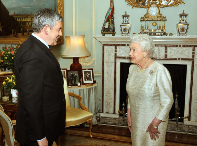 Britain's Queen Elizabeth II greets Gordon Brown at Buckingham Palace for an audience at which he tended his resignation as Prime Minister.