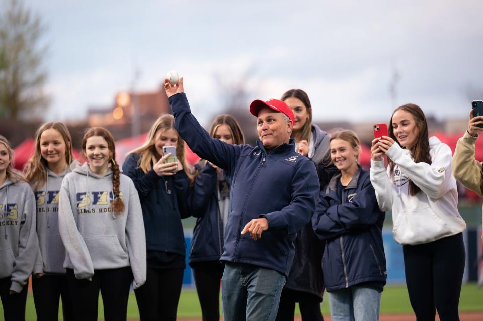 Shrewsbury girls' hockey coach Frank Panarelli throws out the first pitch at Polar Park on Wednesday April 26, 2023.