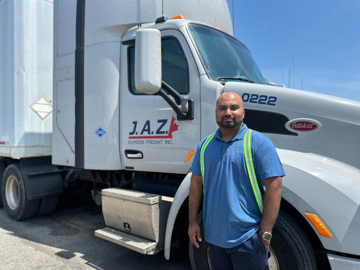 Mayoorun Bala has been driving trucks in the London, Ont., area for three years.  He says he's had numerous close calls with cars trying to overtake him.   (Isha Bhargava/CBC - image credit)