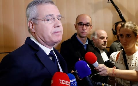 Olivier Laureau, President of the Servier Group, talks to journalists before the start of the trial of the Mediator drug case - Credit: CHARLES PLATIAU&nbsp;/Reuters