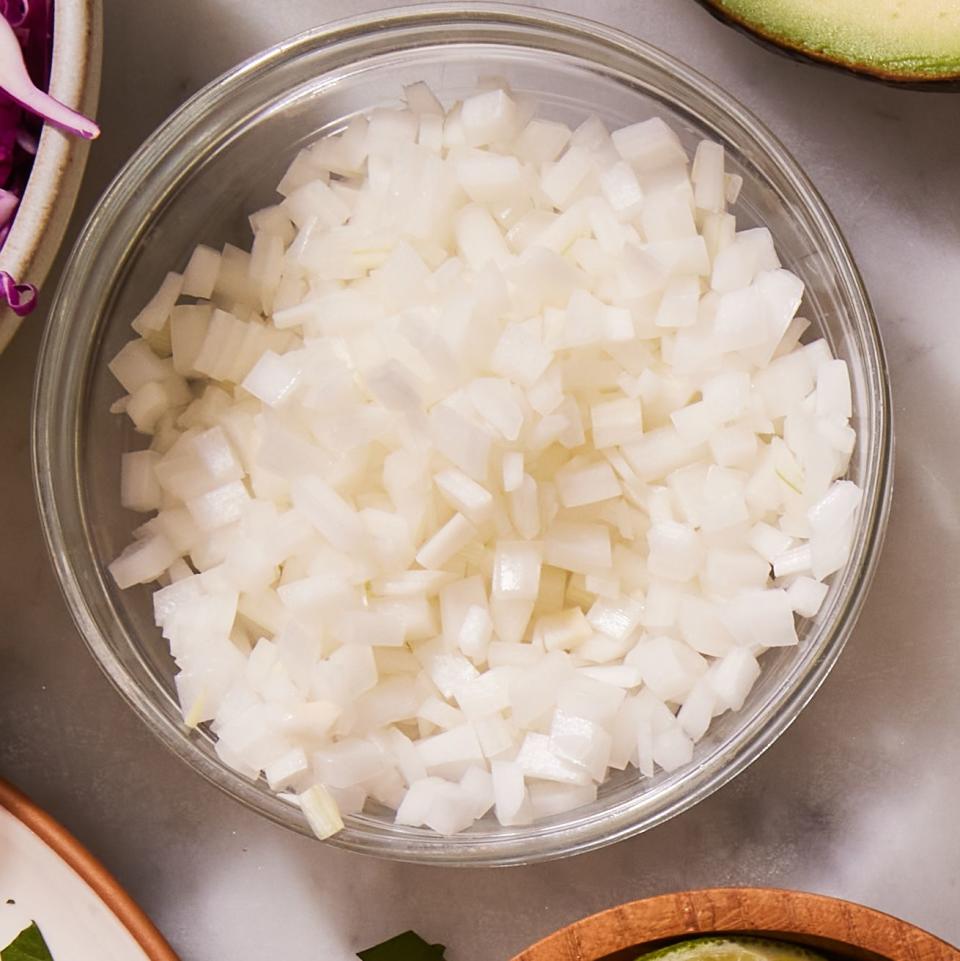 <p>White onions are a classic taco topping that you'll find on many street tacos. They're crisp, sharp, and add the perfect bite.</p>