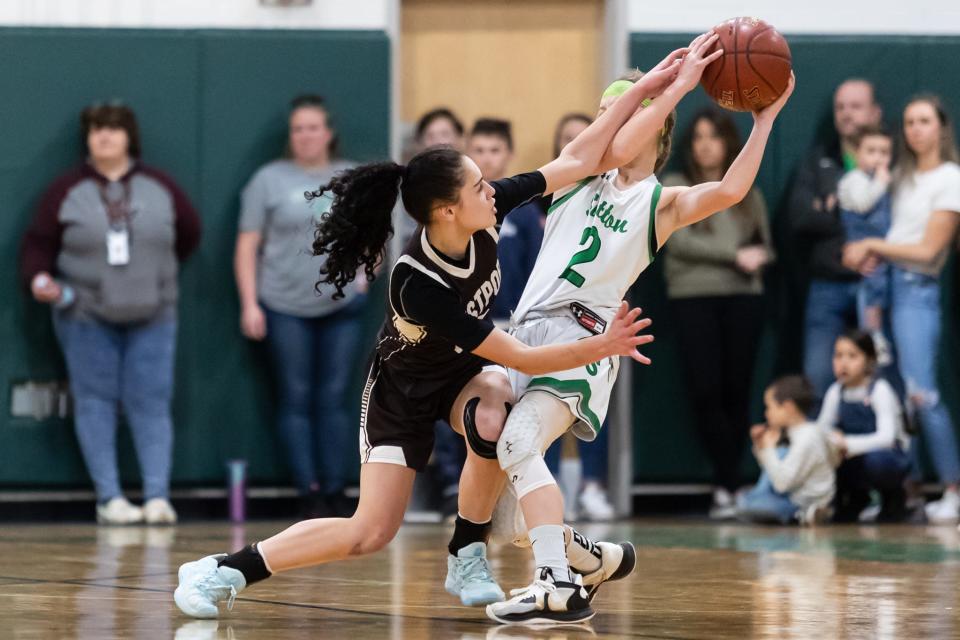 Westport's Korynne Holden battles with Sutton's Courtney Clemens in a Division V Elite Eight game at Sutton Middle/High School in this March 2023 file photo.