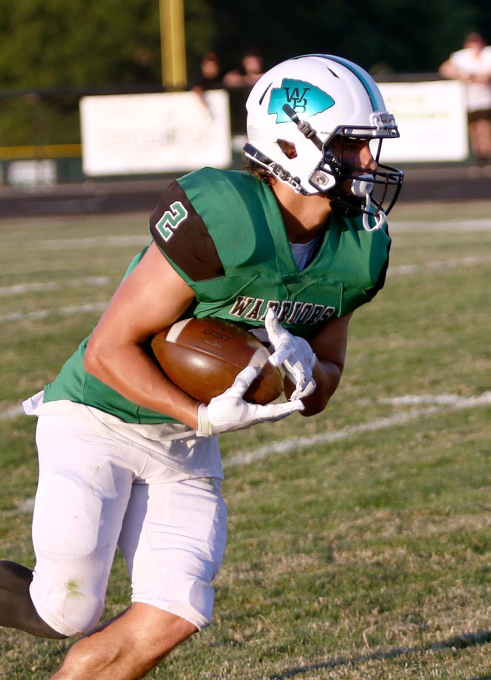 West Branch's Anthony Perry on a kickoff return during their game against Canfield Friday, August 19, 2022 at Clinton Heacock Stadium.