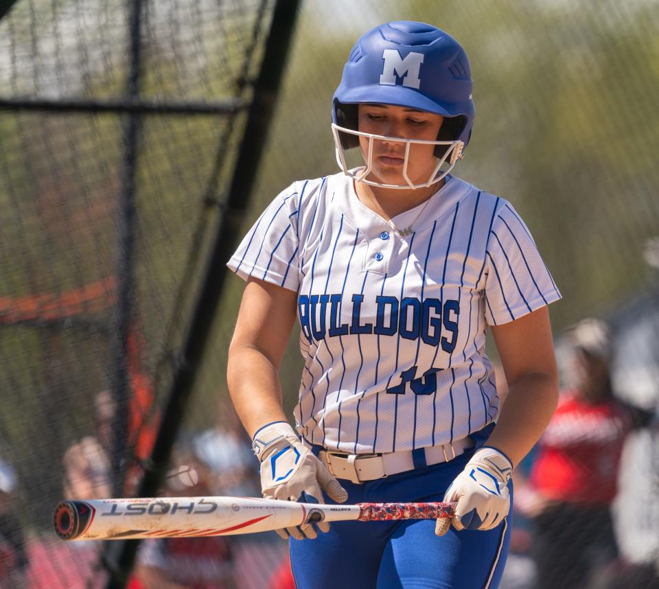 Metuchen's Katheryn Morano (10) gets ready to bat against St. Thomas Aquinas on Saturday, April 15 afternoon at the field at Metuchen High School.