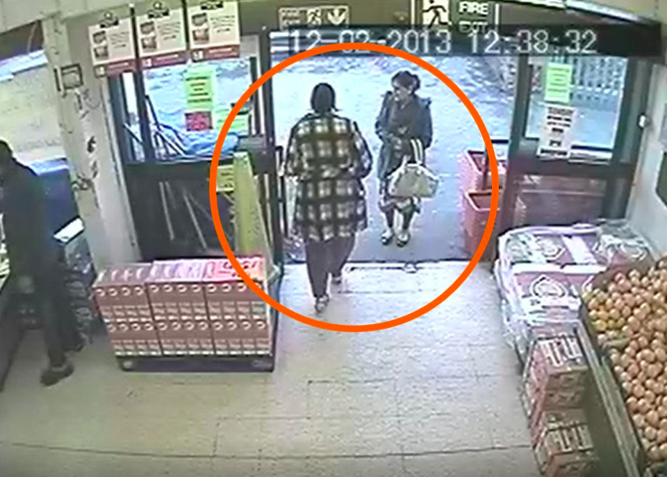 <em>Ashfraf passes one of the women who allegedly placed the pallet of cartons in her way of Ashraf (PA)</em>