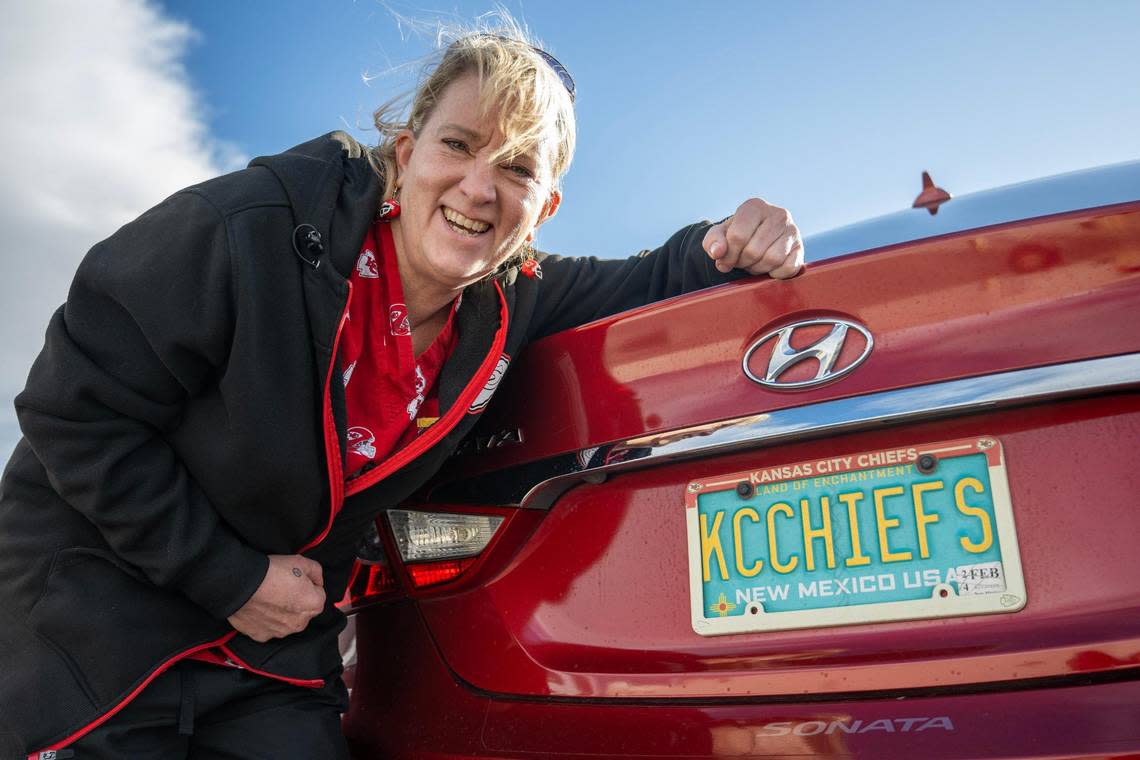 Shannon Jones, a Kansas City Chiefs fan, proudly shows off her Kansas City Chiefs-themed license plate in Albuquerque, N.M. Jones is an active member of the Facebook group called Chiefs Kingdom New Mexico chapter.