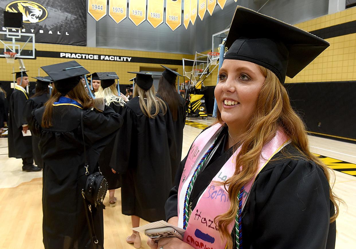 Lily McFarland of St. Louis prepares to graduate on Friday at Mizzou Arena. The University of Missouri College of Education and Human Development graduated 261 students.