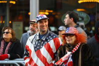 <p>Spectators show patriotism as veterans march during the Veterans Day parade on Fifth Avenue in New York on Nov. 11, 2017. (Photo: Gordon Donovan/Yahoo News) </p>