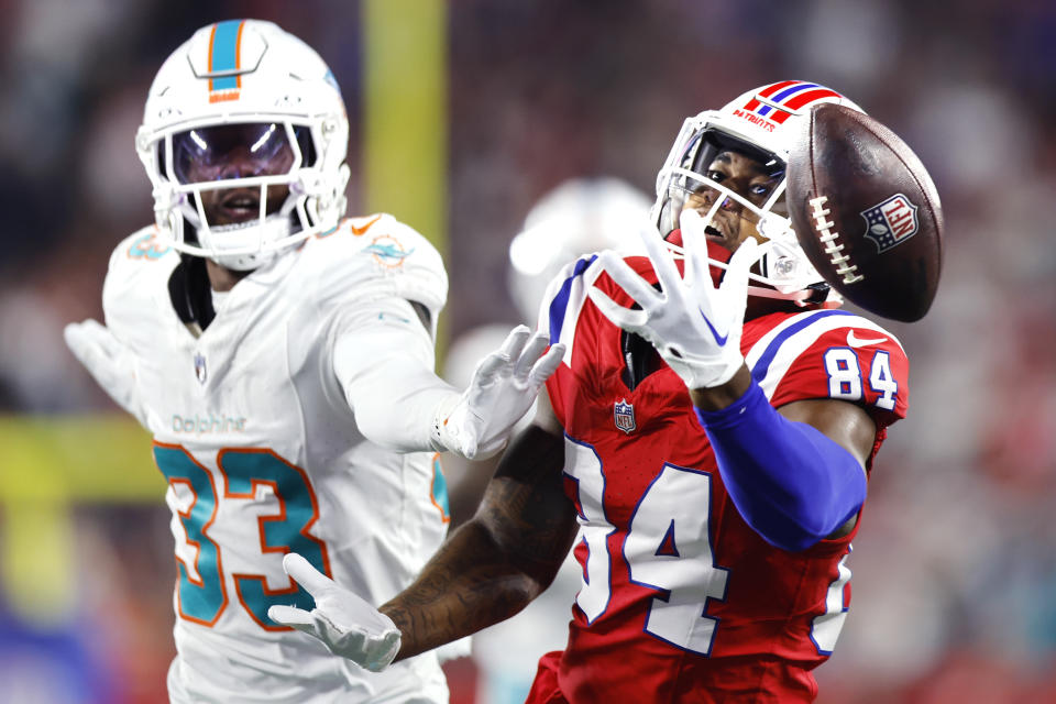 Miami Dolphins cornerback Eli Apple (33) pressures New England Patriots wide receiver Kendrick Bourne (84) on an incomplete pass during the first half of an NFL football game, Sunday, Sept. 17, 2023, in Foxborough, Mass. (AP Photo/Michael Dwyer)