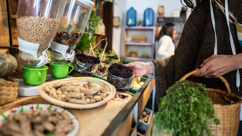 Woman shopping for herbs and spices