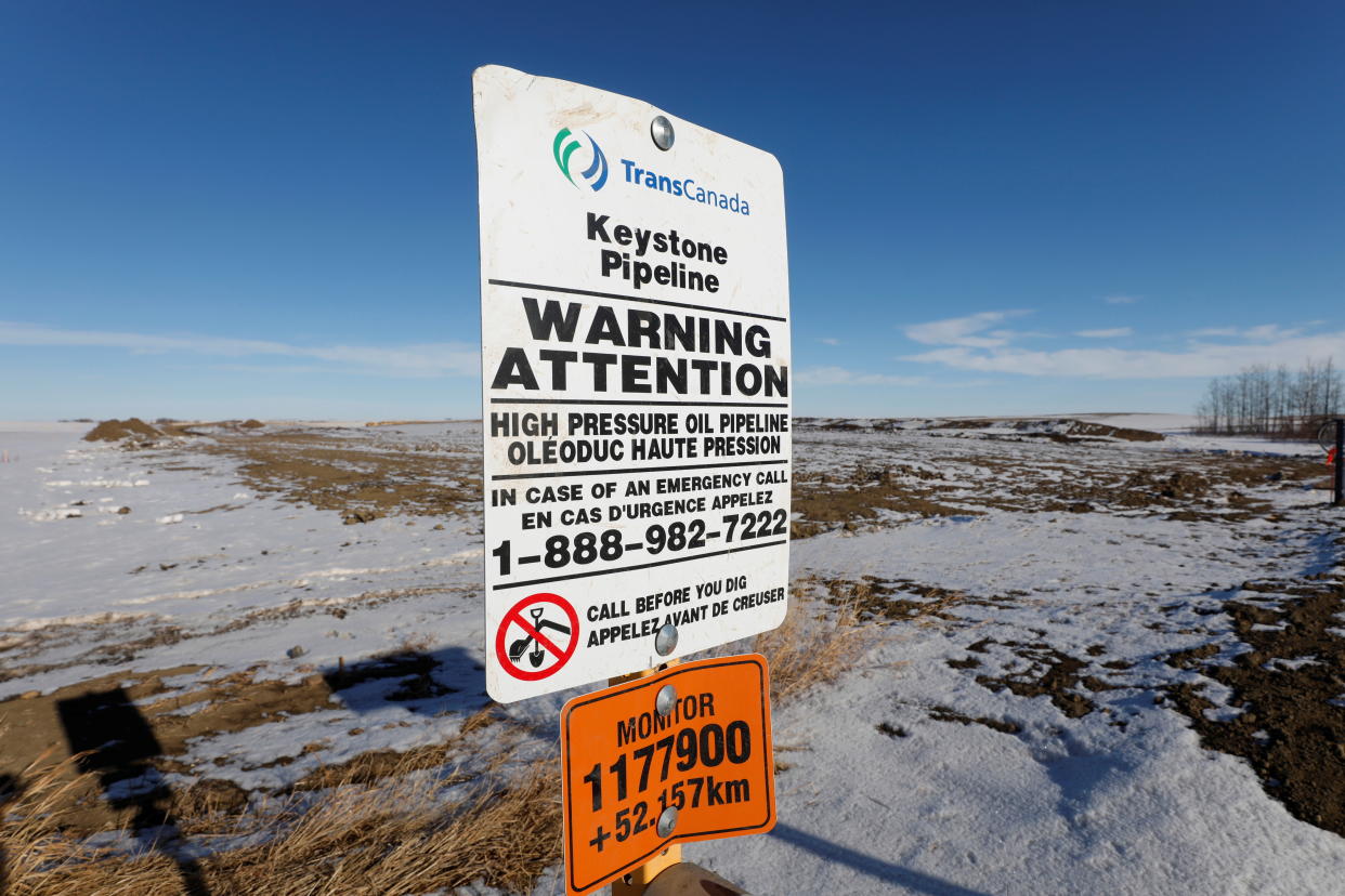 The route of the Keystone XL crude oil pipeline lies idle through a farmer's field after construction stopped near Oyen, Alberta, Canada February 1, 2021.  REUTERS/Todd Korol