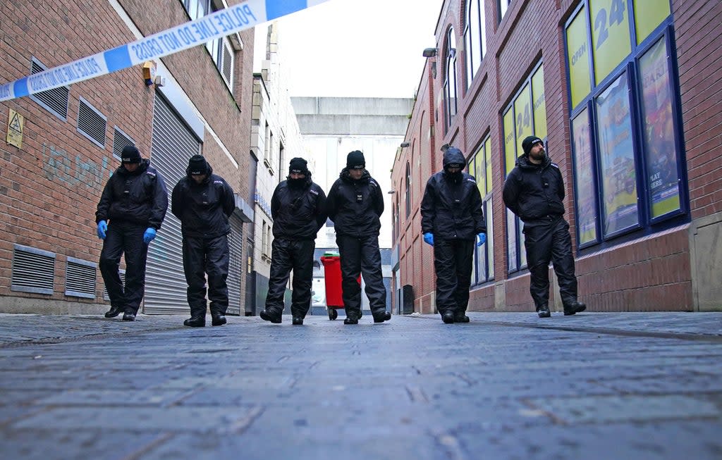 Police search near the scene in Liverpool city centre where 12-year-old Ava White died (Peter Byrne/PA) (PA Wire)