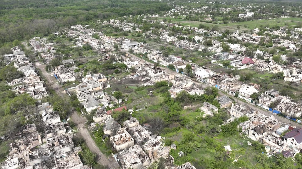 This photo taken from a drone video provided by Ukraine Patrol Police, shows devastation in Chasiv Yar, an eastern Ukrainian city Russia is assaulting, Ukraine, Monday, April 29, 2024. The footage shows the community of Chasiv Yar - which is set amid green fields and woodland - reduced to a skeletal ghost town with few residents left. The apocalyptic scene is reminiscent of the cities of Bakhmut and Avdiivka, which Ukraine yielded after months of bombardment and huge losses for the Kremlin’s forces. (Ukraine Patrol Police via AP)