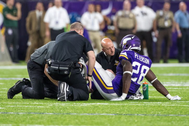 Sep 18, 2016; Minneapolis, MN, USA; Minnesota Vikings running back Adrian Peterson (28) is injured during the third quarter against the Green Bay Packers at U.S. Bank Stadium. The Vikings defeated the Packers 17-14. Mandatory Credit: Brace Hemmelgarn-USA TODAY Sports