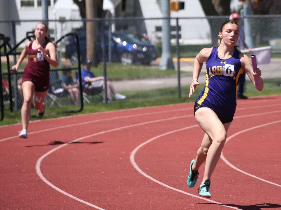 Alayna Smith of Watertown is pictured running in the girls' 800-meter relay during the Eastern South Dakota Conferene Track and Field Championships on Saturday, May 11 at Brookings.The Arrows finished fourth in the race.