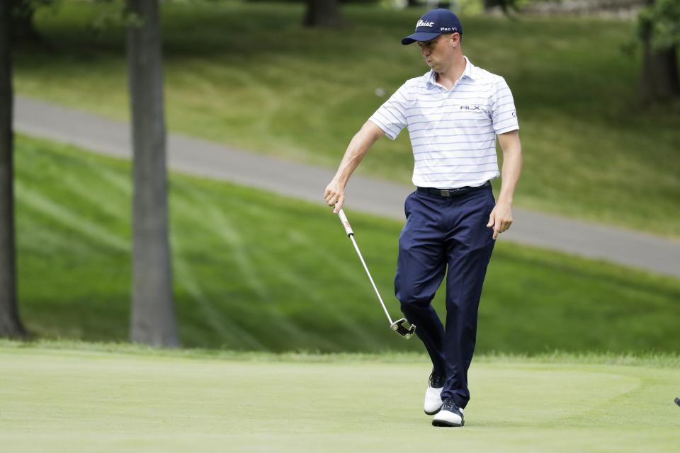 Justin Thomas reacts to his putt on the eighth hole during the third round of the Workday Charity Open golf tournament, Saturday, July 11, 2020, in Dublin, Ohio. (AP Photo/Darron Cummings)