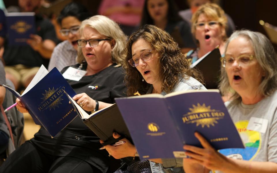 Canterbury Voices singer Jenel Cavazos, center, rehearses "Jubilate Deo," a choral work by composer Dan Forrest, on Sept. 27 at Oklahoma City University.