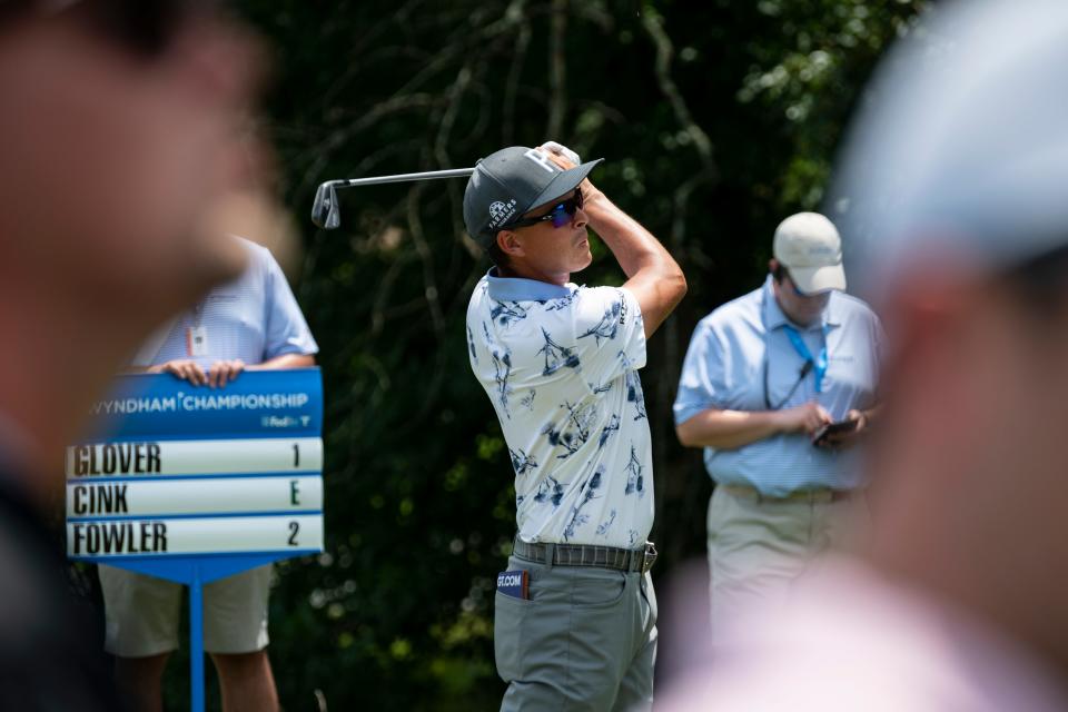 Rickie Fowler watches a shot during Thursday’s first round of the Wyndham Championship at Sedgefield Country Club.