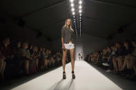 The Nicole Miller Spring 2013 collection is modeled during Fashion Week in New York, Friday, Sept. 7, 2012. (AP Photo/John Minchillo)