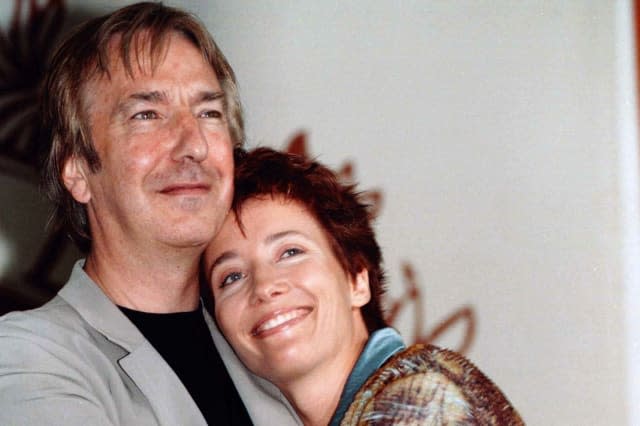 British actor Alan Rickman (L) embraces actress Emma Thompson during a photo call at the 54th Venice Film Festival, August 28. Rickman makes his debut as a director in the human drama " The Winter Guest", starring Oscar-winner Emma Thompson, one of 18 films showing at the Venice Film Festival.ITALY FILM FESTIVAL