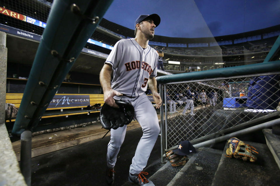 Houston Astros starting pitcher Justin Verlander heads back to the field for the seventh inning of a baseball game against the Detroit Tigers , Monday, Sept. 10, 2018, in Detroit. (AP Photo/Duane Burleson)