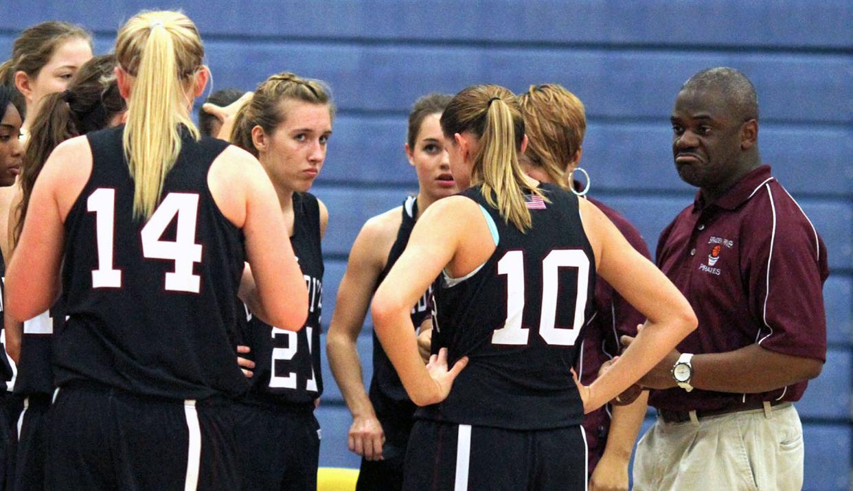 Braden River High girls basketball coach Carl Williams talks with his team during a timeout against Charlotte High during a Class 7A-District 11 quarterfinal game Jan. 30, 2012, at Wally Keller Gymnasium in Punta Gorda.