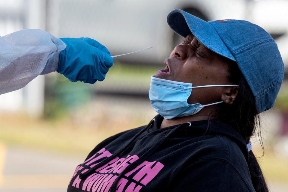 "I'm afraid of outside," said Lakesha Kelson, a mother and frontline worker. Kelson is tested for the coronavirus at first  site opened in Paterson on Monday, May 4, 2020. Kelson has been out of work from her fast food job since April 6, 2002 and needs to be retested before returning.