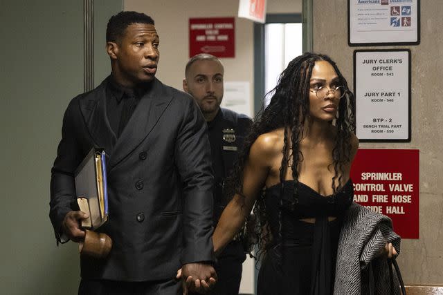 <p>AP Photo/Yuki Iwamura</p> Jonathan Majors and Meagan Good arrive at court for a trial on his domestic violence case, December 2023