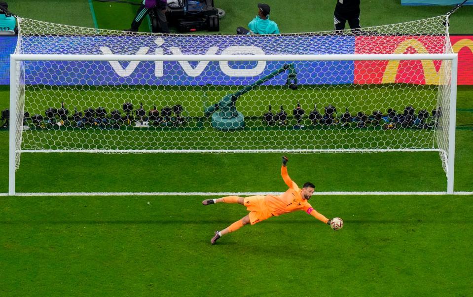 France's goalkeeper Hugo Lloris makes a save during the World Cup semifinal s - (AP Photo/Petr David Josek