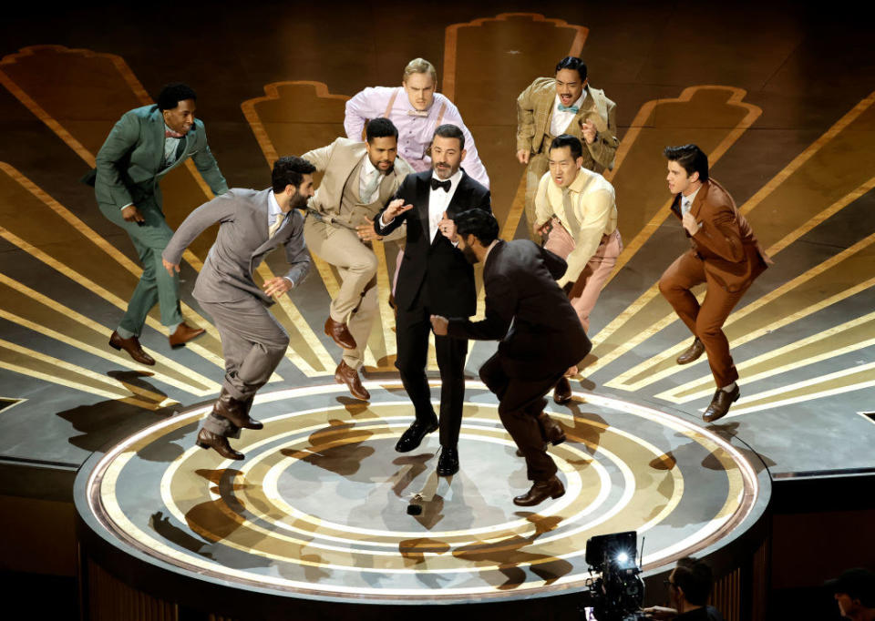 Host Jimmy Kimmel speaks onstage during the 95th Annual Academy Awards, surrounded by dancers