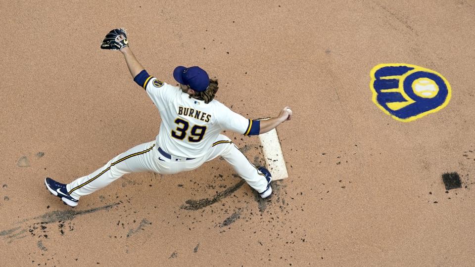 Milwaukee Brewers starting pitcher Corbin Burnes throws during the first inning of game 1 of a doubleheader baseball game against the San Francisco Giants Thursday, Sept. 8, 2022, in Milwaukee. (AP Photo/Morry Gash)