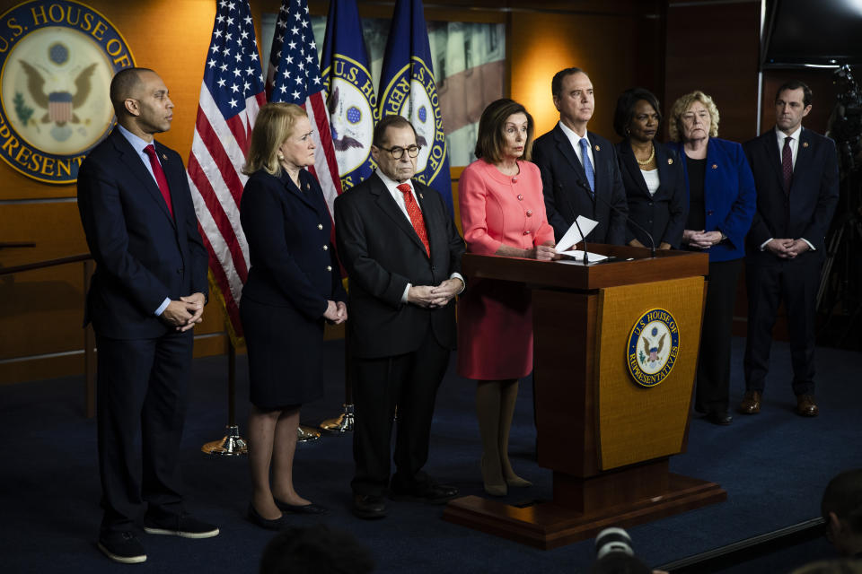 House Speaker Nancy Pelosi of Calif., speaks during a news conference to announce impeachment managers on Capitol Hill in Washington, Wednesday, Jan. 15, 2020. With Pelosi from left are Rep. Hakeem Jeffries, D-N.Y., Rep. Sylvia Garcia, D-Texas, House Judiciary Committee Chairman, Rep. Jerrold Nadler, D-N.Y., Pelosi, House Intelligence Committee Chairman Adam Schiff, D-Calif., Rep. Val Demings, D-Fla., Rep. Zoe Lofgren, D-Calif. and Rep. Jason Crow, D-Colo. (AP Photo/Matt Rourke)