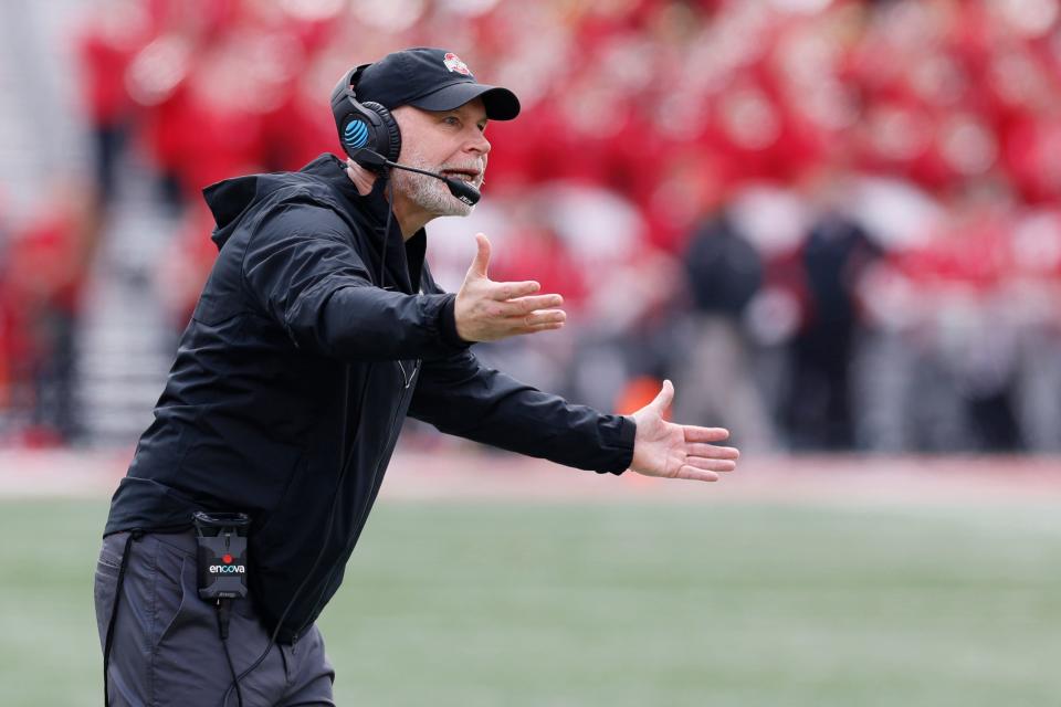Ohio State defensive coordinator Jim Knowles shouts out instructions to his team during spring practice. His play-calling helped the Buckeyes defeat Notre Dame last week.