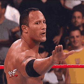 Dwayne "The Rock" Johnson utilizes his "Just Bring It" hand motion
