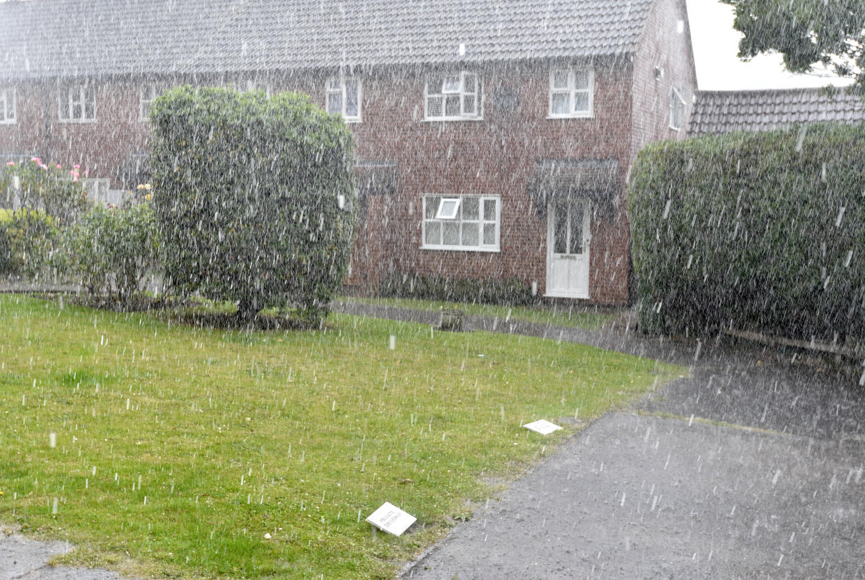 Heavy rain in Billericay, Essex during a brief but heavy storm. A yellow warning for storms has been issued by the Met Office for parts of the East Midlands, South East and East of England from 1pm on Tuesday until the end of the day. Picture date: Tuesday July 20, 2021.