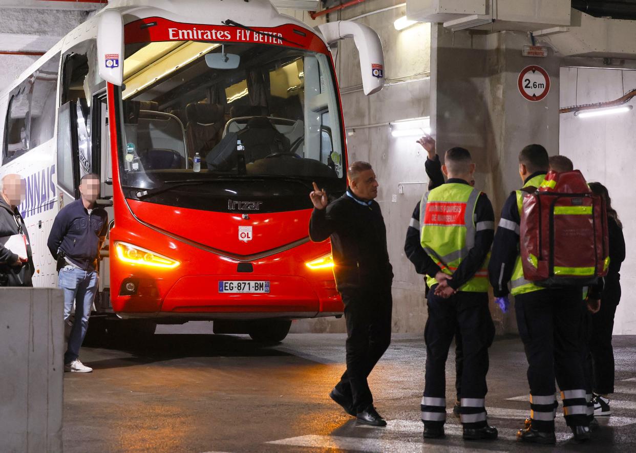 Lyon's buss is seen after the attack with shattered glass on its right side. (Christophe Simon/AFP via Getty Images)