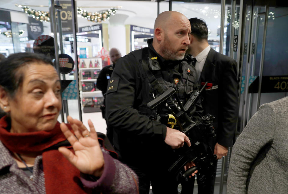 <p>Armed police officers mix with shoppers in an Oxford Street store, in London, Britain on Nov. 24, 2017. (Photo: Peter Nicholls/Reuters) </p>