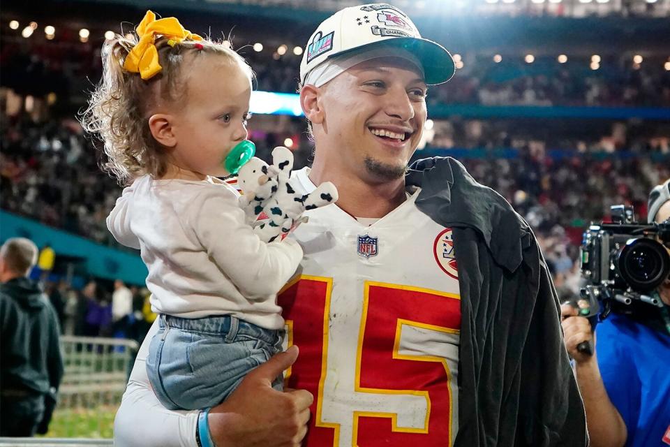 Mandatory Credit: Photo by Brynn Anderson/AP/Shutterstock (13765221ra) Kansas City Chiefs quarterback Patrick Mahomes holds his daughter, Sterling Skye Mahomes, after the NFL Super Bowl 57 football game against the Philadelphia Eagles, in Glendale, Ariz. The Kansas City Chiefs defeated the Philadelphia Eagles 38-35 Super Bowl Football, Glendale, United States - 12 Feb 2023