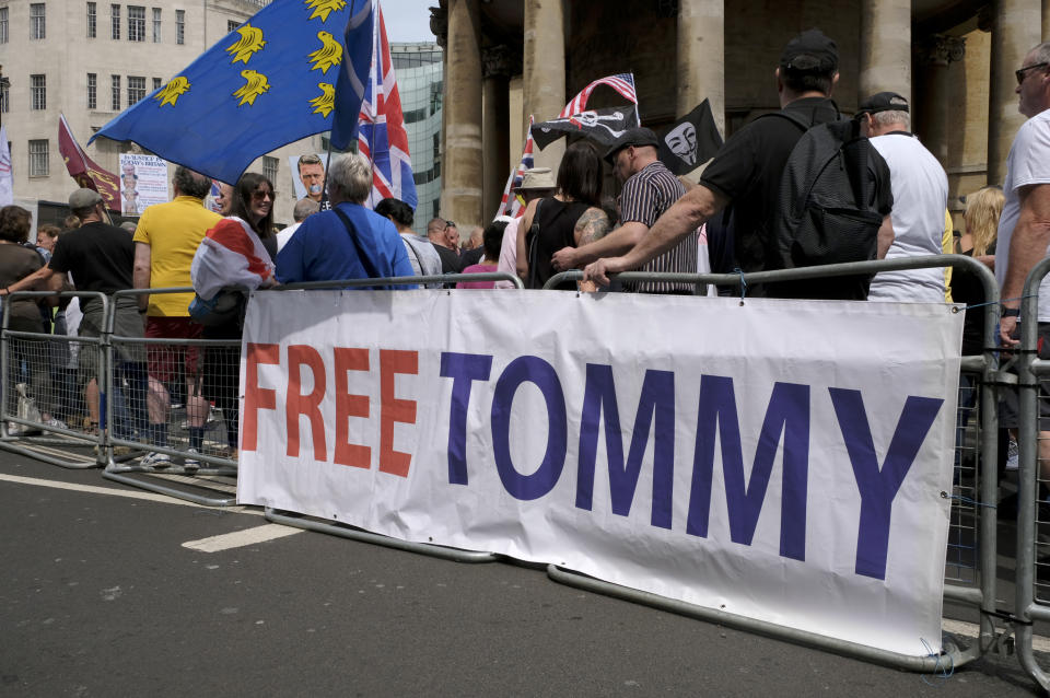  A banner saying, Free Tommy, during the rally in London. Supporters gathered outside BBC to demand the freedom of their jailed right-wing leader Stephen Yaxley-Lennon aka Tommy Robinson. During the rally, police had to intervene and raise their batons when a Police van was attacked by the Tommy Robinson supporters. A person was arrested after the confrontation. (Photo by Andres Pantoja / SOPA Images/Sipa USA) 