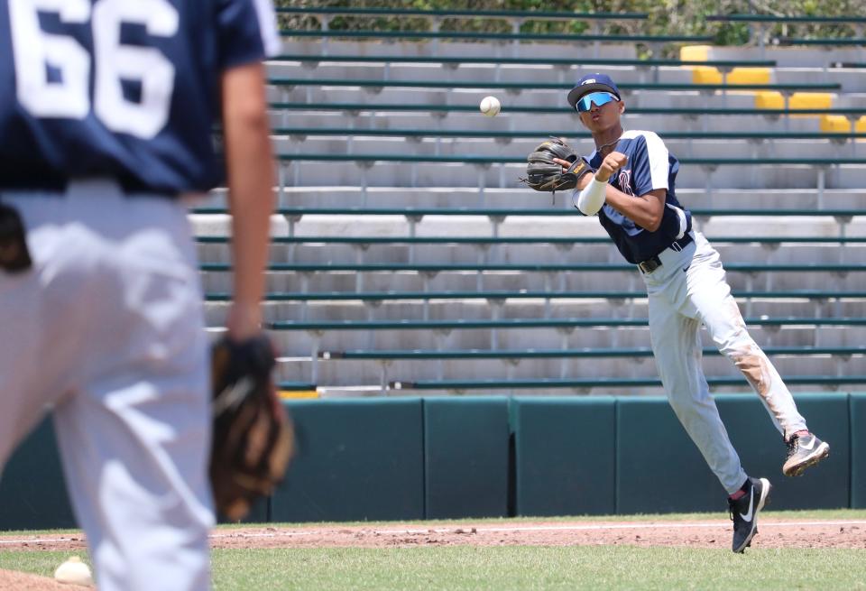 Trey Lawrence makes a fielding play for Team Paige at the 2022 Breakthrough Series camp at the Jackie Robinson Training Complex in Vero Beach.