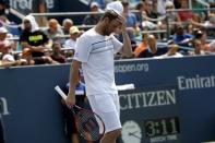 Mardy Fish of the U.S. walks to the net after the final point in his five set loss to Feliciano Lopez of Spain at the U.S. Open Championships tennis tournament in New York, September 2, 2015. REUTERS/Mike Segar Picture Supplied by Action Images