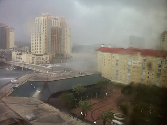 The Tampa waterspout transformed into a tornado when it hit land, damaging roofs and five vehicles. (Robert Siegel/National Weather Service)