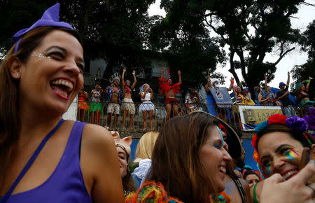 Revellers take part in an annual block party known as "Ceu na Terra" (Heaven on Earth), one of the many carnival parties to take place in the neighbourhoods of Rio de Janeiro, Brazil February 25, 2017. REUTERS/Ricardo Moraes