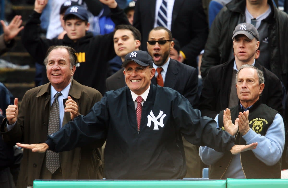 Giuliani with Michael Bloomberg cheering on the Yankees in April 2007 (Getty)