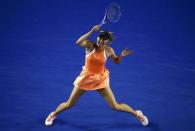 Russia's Maria Sharapova hits a shot during her fourth round match against Switzerland's Belinda Bencic at the Australian Open tennis tournament at Melbourne Park, Australia, January 24, 2016. REUTERS/Jason O'Brien Action Images via Reuters