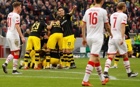 Football Soccer - Borussia Dortmund v Cologne - German Bundesliga - RheinEnergie Stadion , Cologne, 19/12/15 Borussia Dortmund's players celebrate the first goal. REUTERS/Ina Fassbender